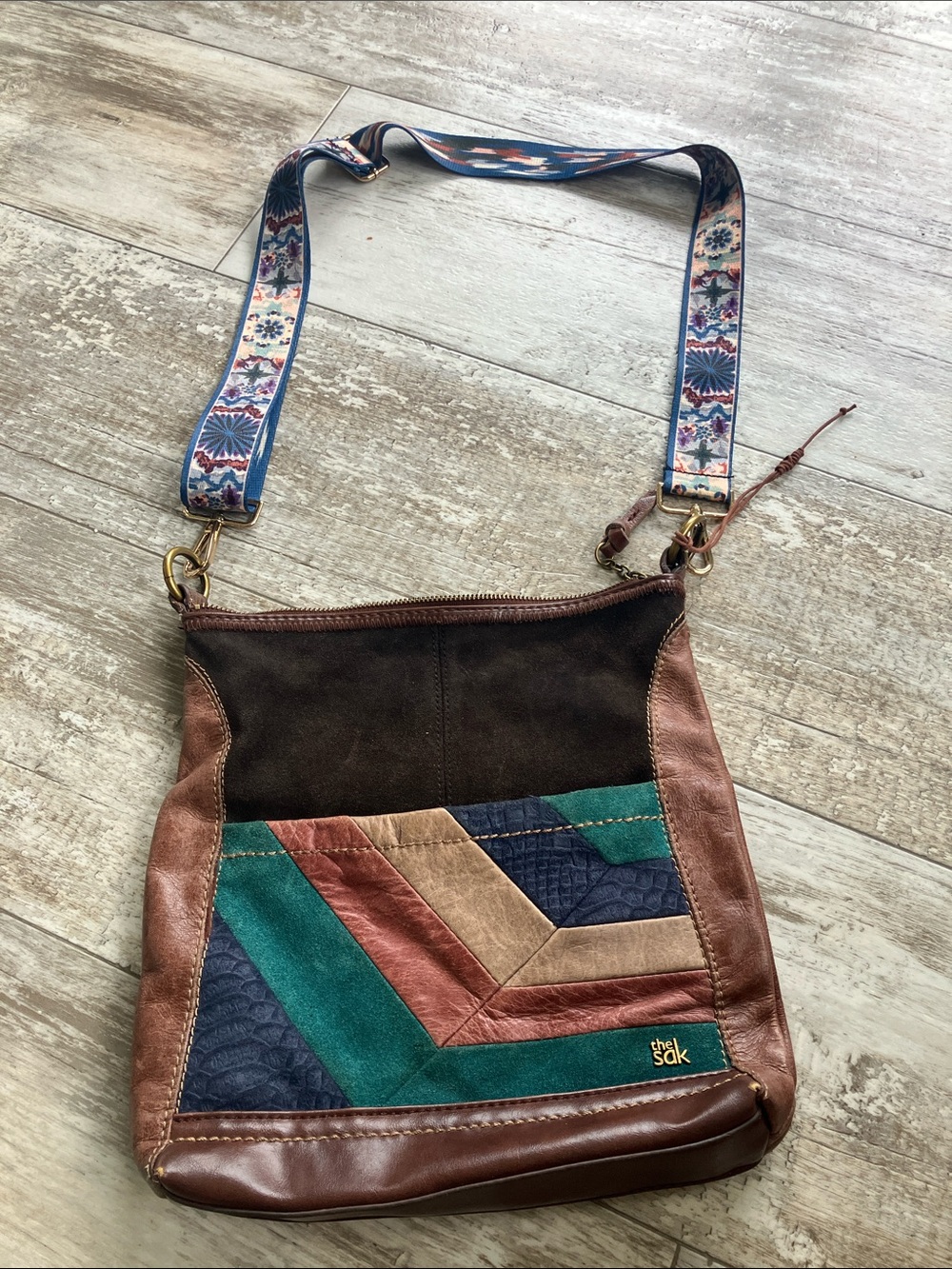 The Sak Teal Navy Brown Patchwork Leather Crossbody with Patterned Strap